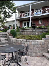 View of patio with outdoor dining area