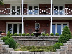 Entrance to property with french doors and brick siding