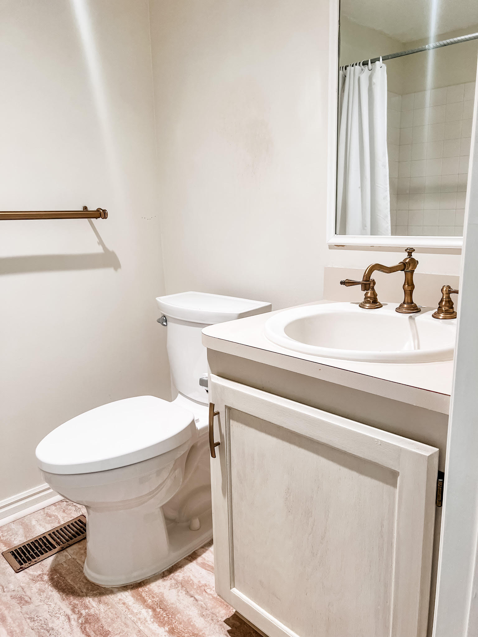 Full bathroom featuring vanity and a shower with curtain
