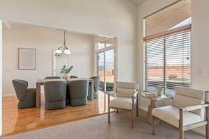 Dining room featuring light wood-type flooring and baseboards