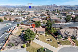 Aerial view of residential area featuring mountains