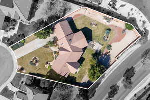 Aerial view of property and surrounding area with property parcel outlined
