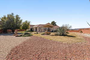View of front of house featuring a tile roof