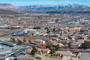 Aerial perspective of suburban area with mountains