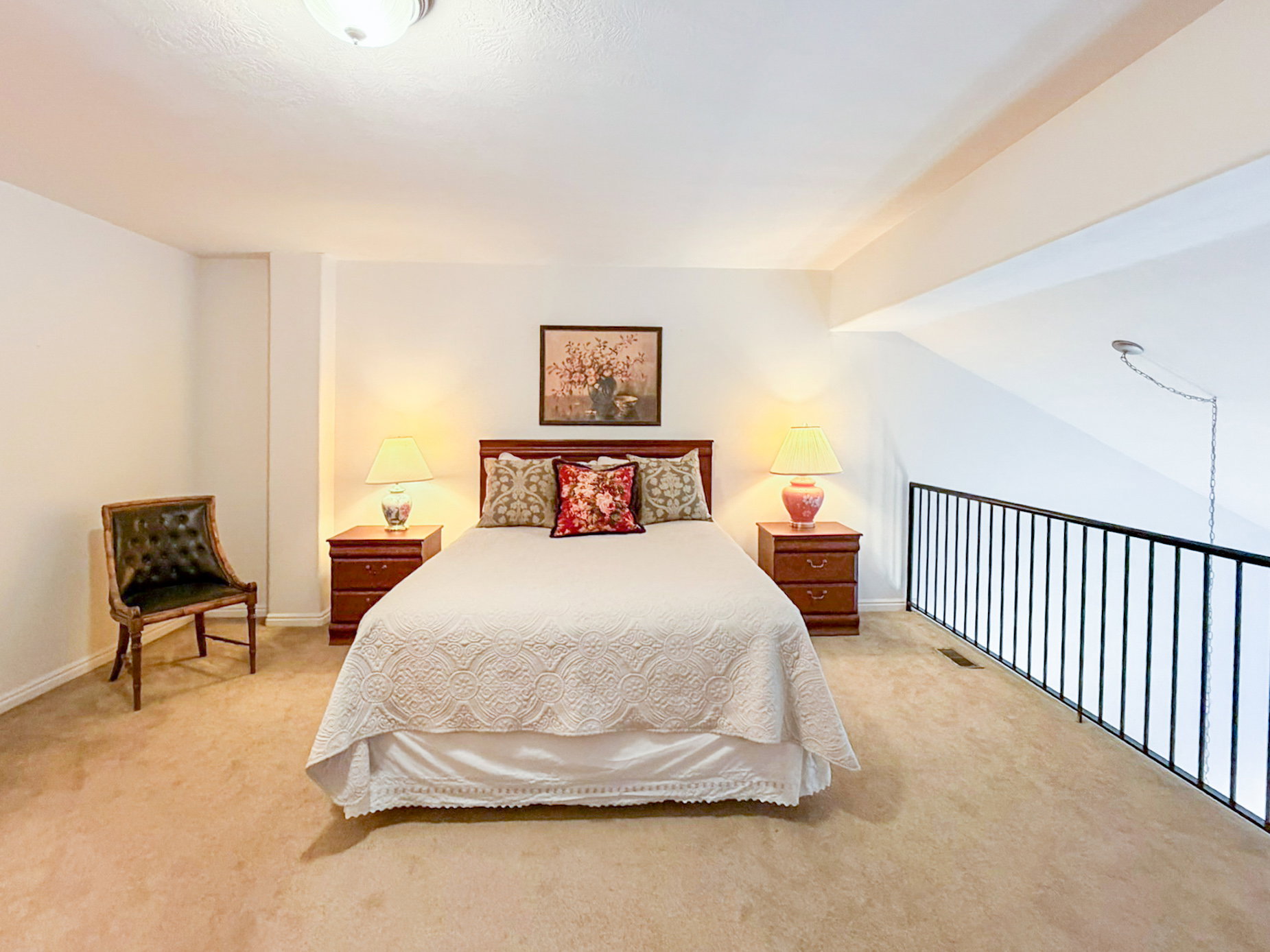 Bedroom with light carpet