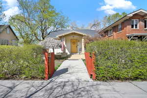 View of front of home featuring brick siding