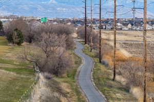 View of asphalt street with a residential view