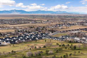 Aerial view of residential area featuring a mountainous background