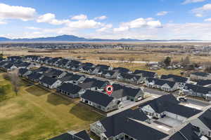 Aerial view of residential area with a mountain backdrop