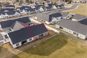 Aerial view of residential area with property parcel outlined