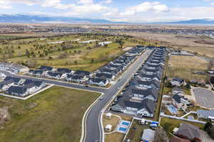 View of property location featuring nearby suburban area and mountains