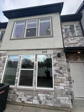 Exterior view of stone siding and stucco siding