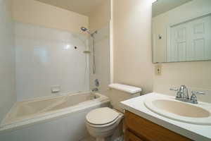 Full primary bath with vanity and shower / bath tub combination