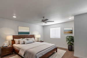 Bedroom featuring ceiling fan and recessed lighting