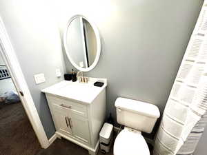 Bathroom with vanity and toilet
