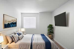 Bedroom featuring baseboards