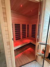 Custom-built Infrared Sunlighten Sauna with Chromotherapy lights and eucalyptus wood ceiling and walls