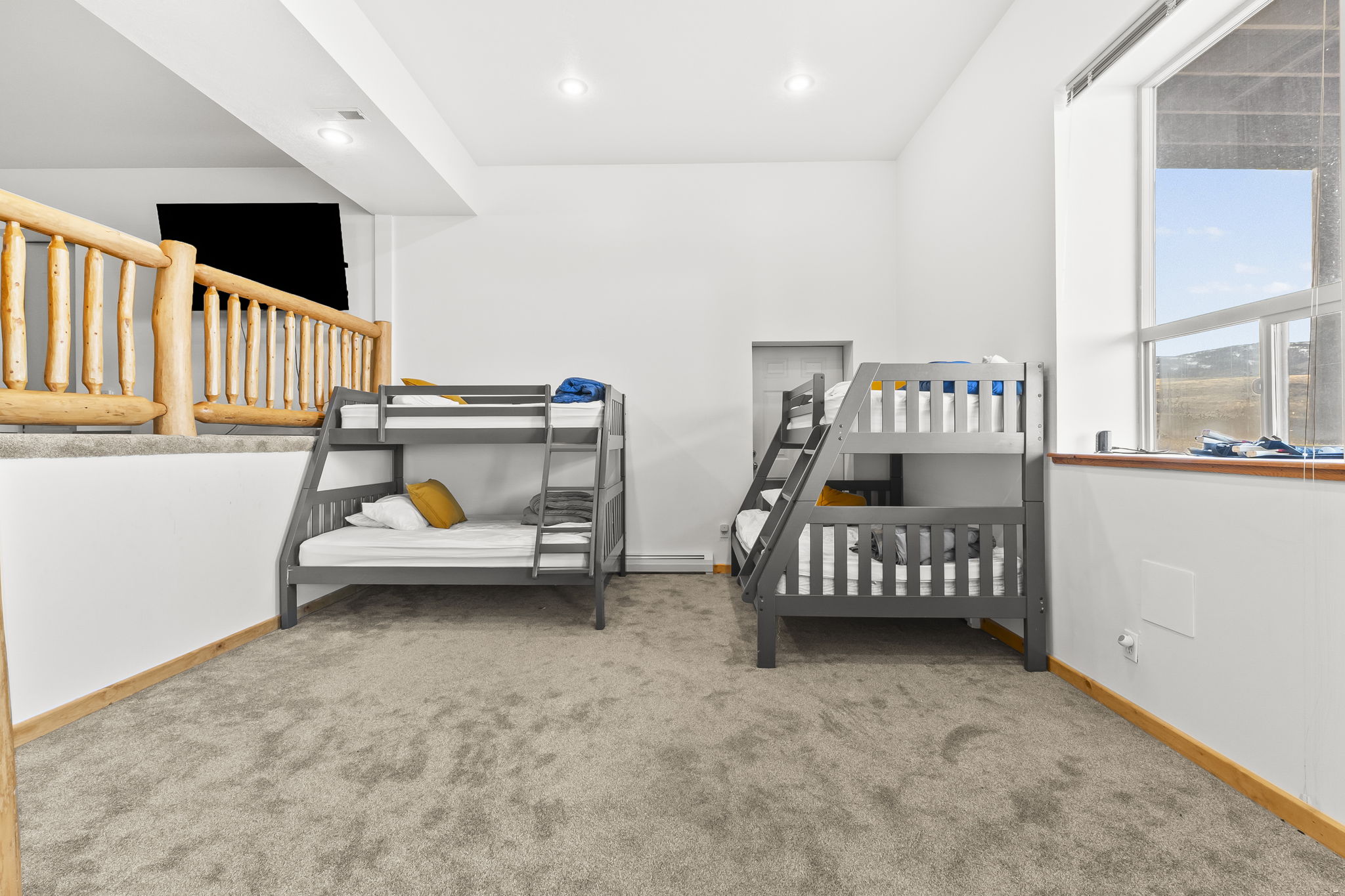 Carpeted bedroom featuring baseboards and recessed lighting