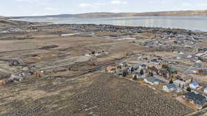 View of property location featuring nearby suburban area and a large body of water