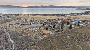 Aerial view of residential area featuring a water and mountain view