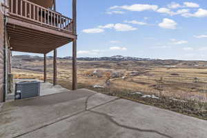 View of patio featuring a mountain view