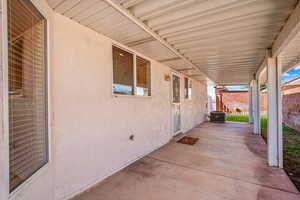 Back patio with room for table, BBQ, etc