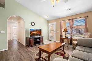 Living area featuring arched walkways