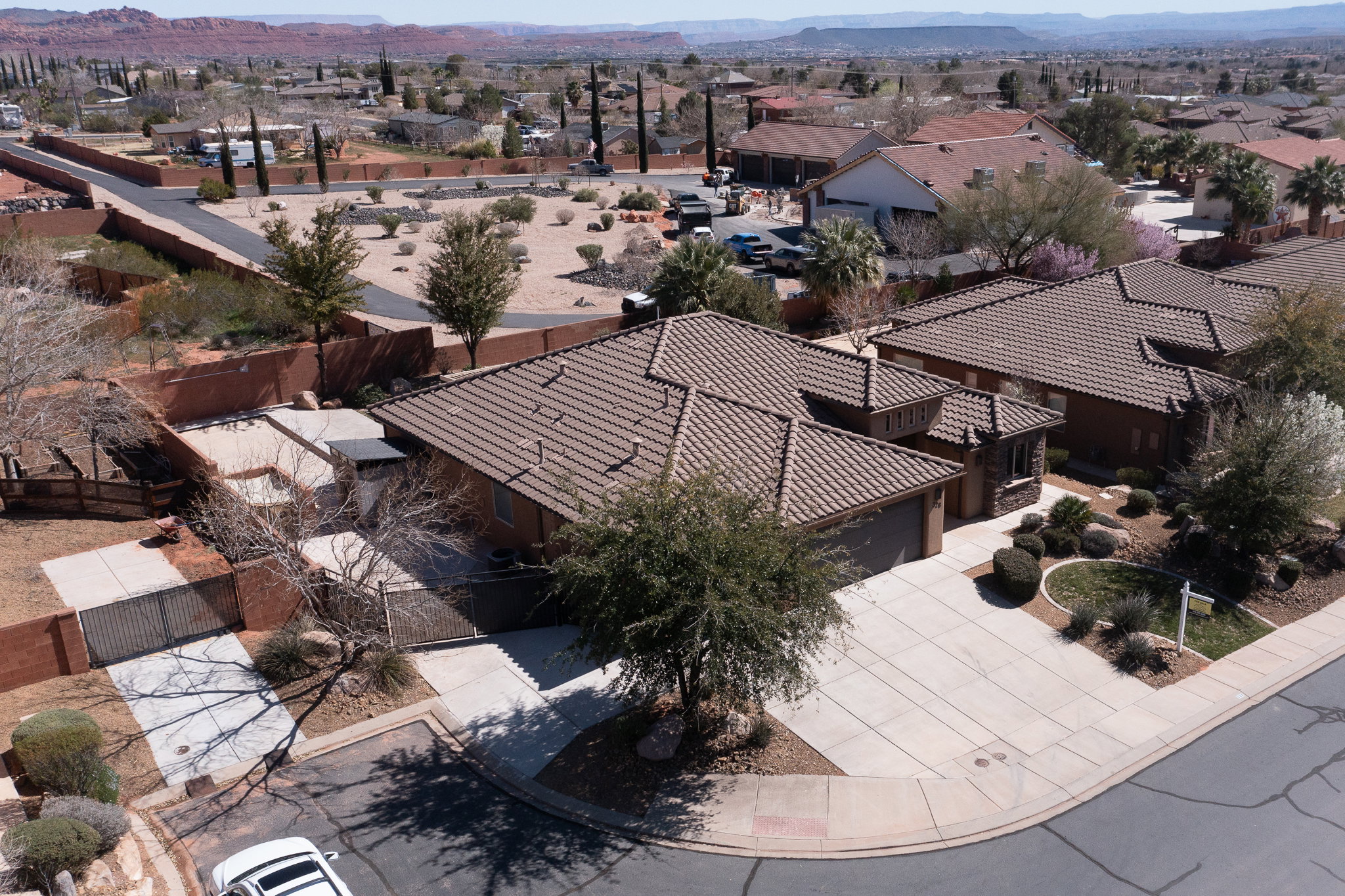 Aerial view of residential area featuring mountains