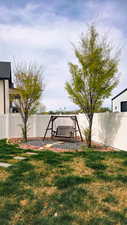 View of fenced backyard