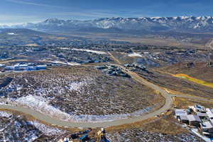 Snowy aerial view with a mountain view