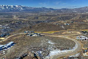 Aerial view of property's location with mountains