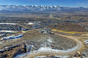 Aerial overview of property's location featuring mountains