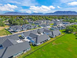 Aerial view of residential area featuring a mountain backdrop