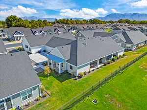 Aerial view of residential area featuring a mountain backdrop