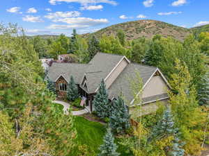 View of subject property featuring mountains