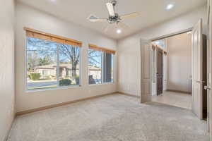 Unfurnished bedroom featuring light carpet, recessed lighting, and ceiling fan
