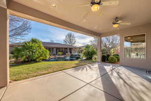 View of patio featuring a ceiling fan
