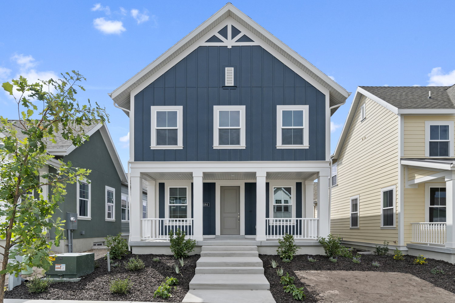 View of front of home featuring board and batten siding and a porch