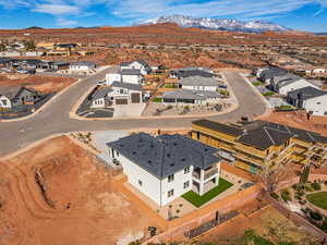 Aerial view of residential area with a mountain backdrop