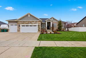 Grass in this photo has been digitally enhanced to illustrated the potential landscaping during the growing season.