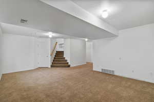 Finished basement family room with carpet