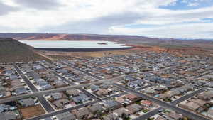 Aerial perspective of suburban area featuring a water and mountain view