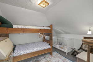 Bedroom with light colored carpet