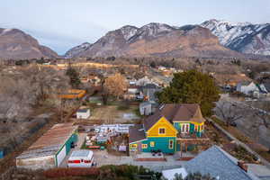 Aerial view of residential area featuring mountains