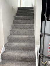 Staircase with secured water heater