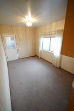 Carpeted empty room with plenty of natural light