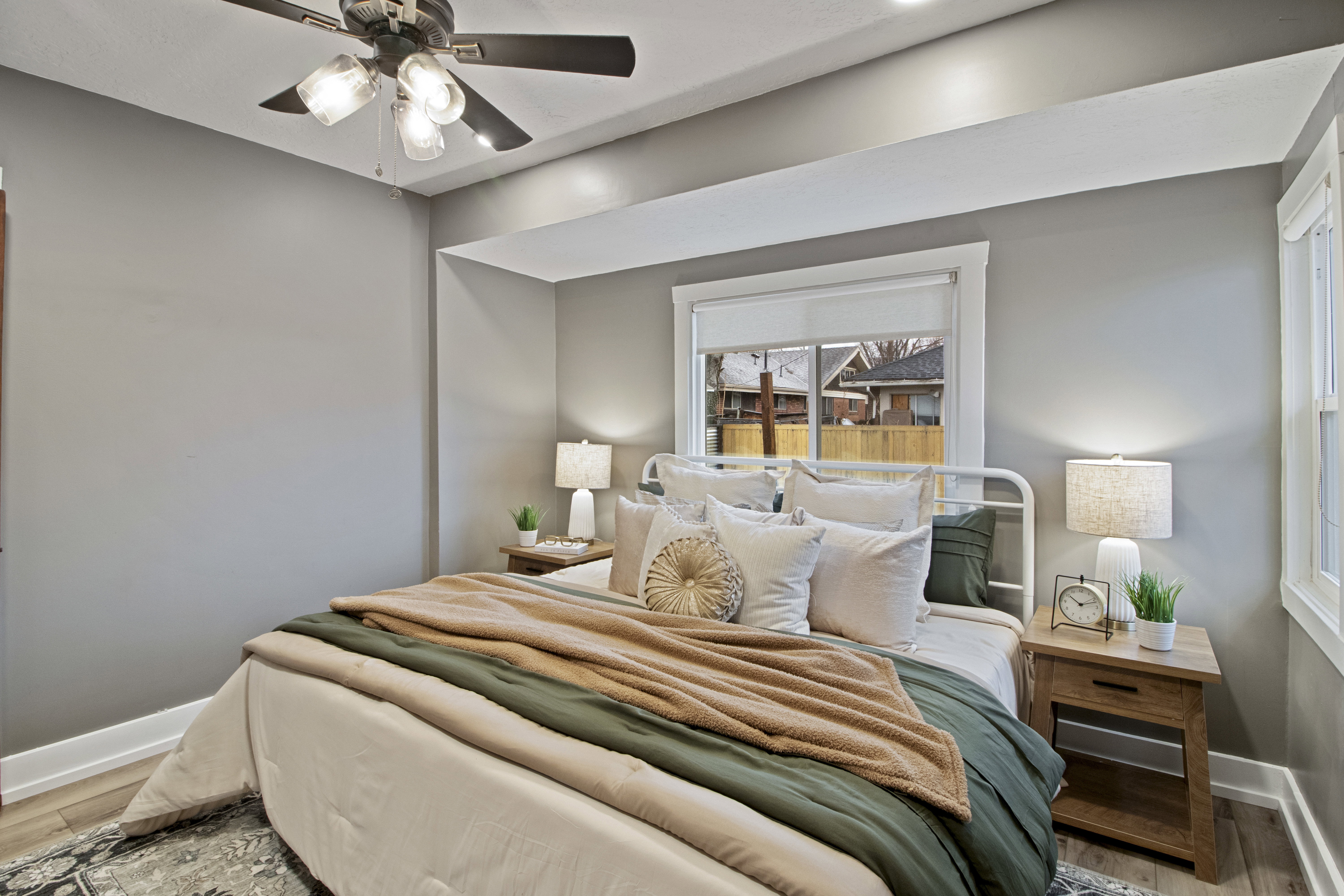 Bedroom featuring light wood-type flooring and ceiling fan