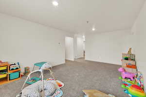 Rec room featuring carpet floors and recessed lighting