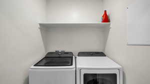 Laundry room with washing machine and dryer