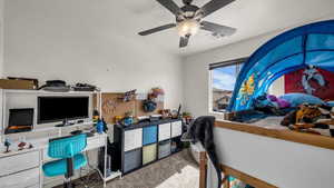 Office space featuring carpet flooring and ceiling fan